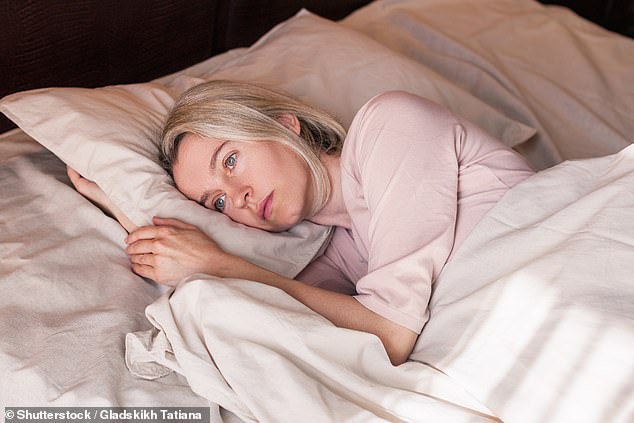 Women aged 40 to 60 get an average of just 6 hours and 36 minutes of sleep per night due to frequent insomnia and night sweats, a study shows (stock image)