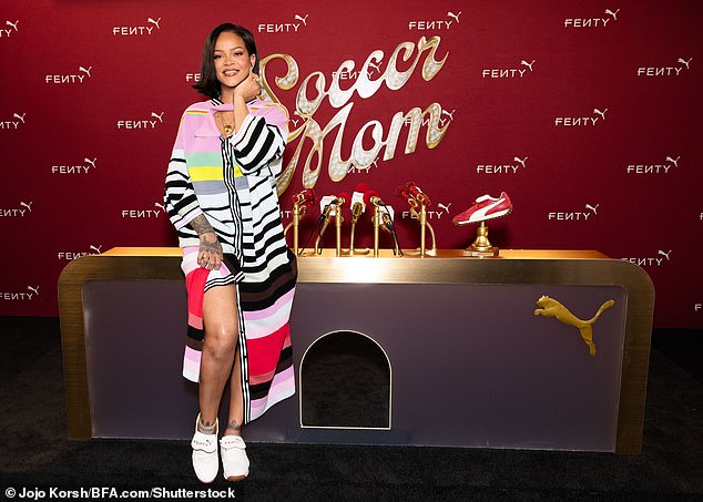 Rihanna proclaimed herself 'Soccer Mom' in large gold letters during a press conference for her new Fenty X Puma 'Avanti' collection, held Thursday at BLT Studios in Los Angeles