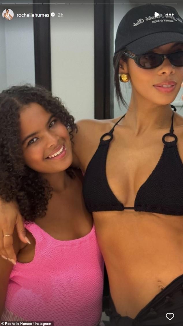 Rochelle Humes showed off her abs as she rocked a black bikini as she posed for a smiley photo alongside her daughter Alaia-May