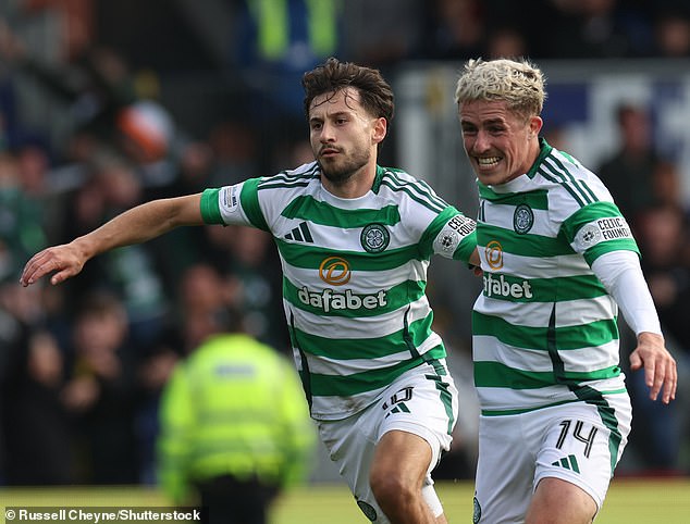 Kuhn, left, and McGowan drive away in delight after German's winning goal