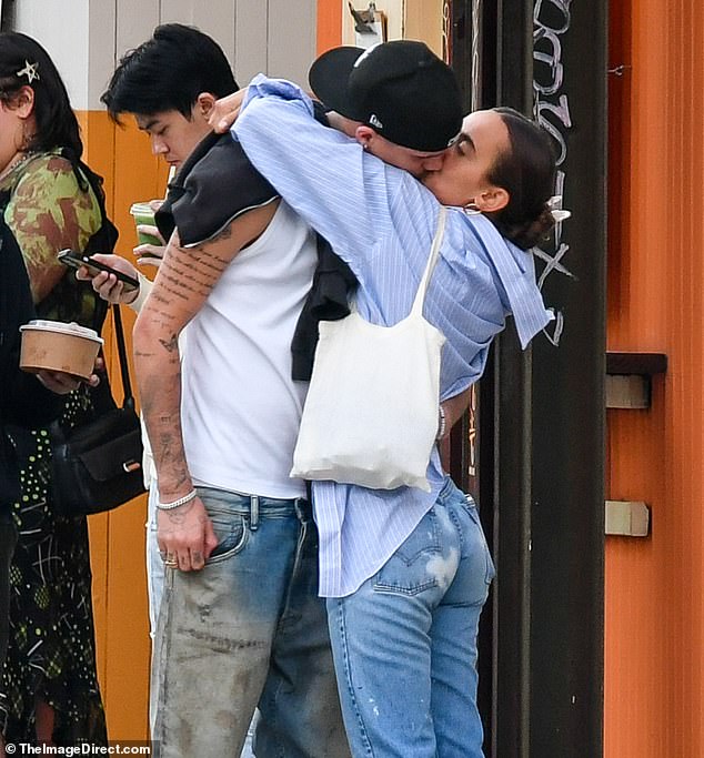 Romeo Beckham, 22, confirmed his romance with American photographer Gray Sorrenti as they packed on the PDA during a romantic stroll in New York this week