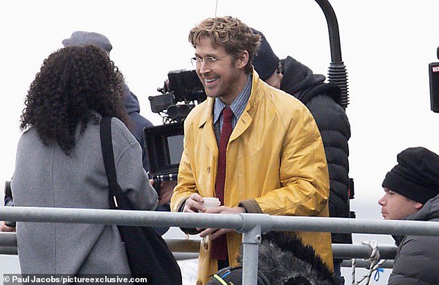 Ryan Gosling chatted to a co-star while filming Project Hail Mary in rainy conditions on South Parade Pier in Southsea on Sunday