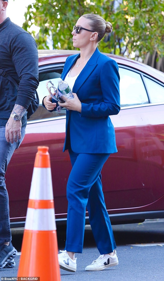 As filming for Jurassic World Rebirth comes to a close, Scarlett Johansson, 39, headed out to film a scene with co-star Rupert Friend in an SUV on Saturday.