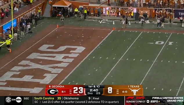 Angry Texas fans threw bottles on the field after a controversial call against Georgia