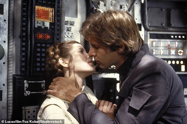 Pictured: Princess Leia (Carrie Fisher) and Han Solo (Harrison Ford) sharing a kiss in 'The Empire Strikes Back' (1980)