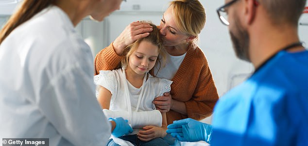 Little girl with mother during an operation examination. The study found that those taken to hospital by carers typically waited an hour before being seen by emergency doctors, rather than immediately if they were there blue-lit