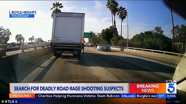 Shocking dashcam footage of the deadly incident, which seriously injured another person, showed the Dodge driver, who has not yet been identified, running along the open highway with a gun in hand.