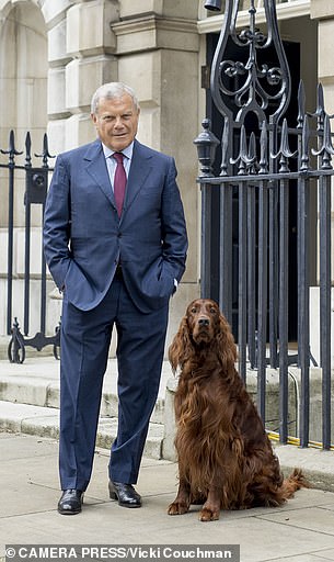 FEARSOME DUO: Sir Martin Sorrell with office dog body Ferus at HQ