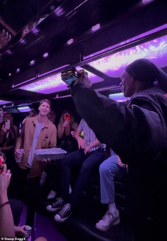 Fans saw Snoop Dogg holding three phones at once in the viral party bus video.