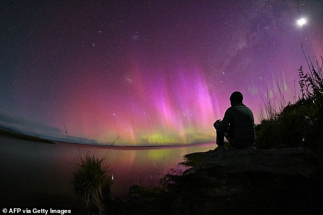 Australian stargazers could soon be treated to a stunning display of aurora australis (pictured), or the Southern Lights, on Thursday, Friday and Saturday evenings