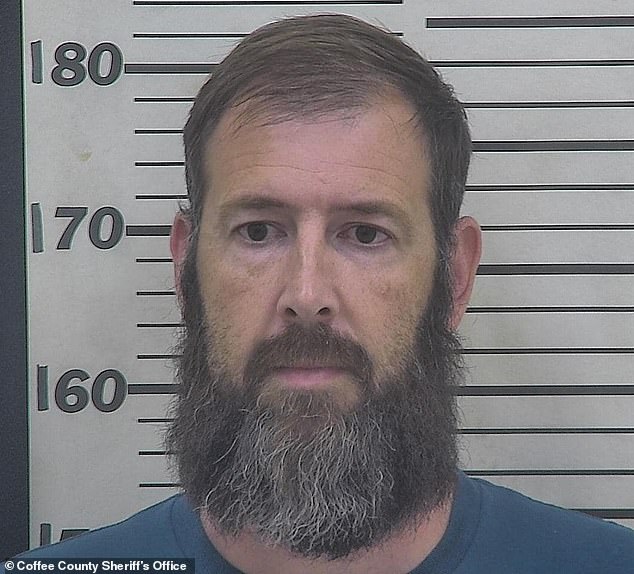 Chris Johnson, 39, was arrested and charged Sunday after officers with the Coffee County Sheriff's Office discovered the remains at Johnson Funeral & Cremation Services in Douglas