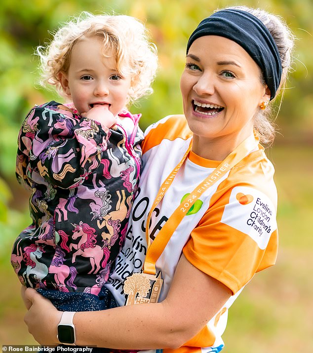 Molly with her mother Rose after completing a run for Evelina London Children's Charity