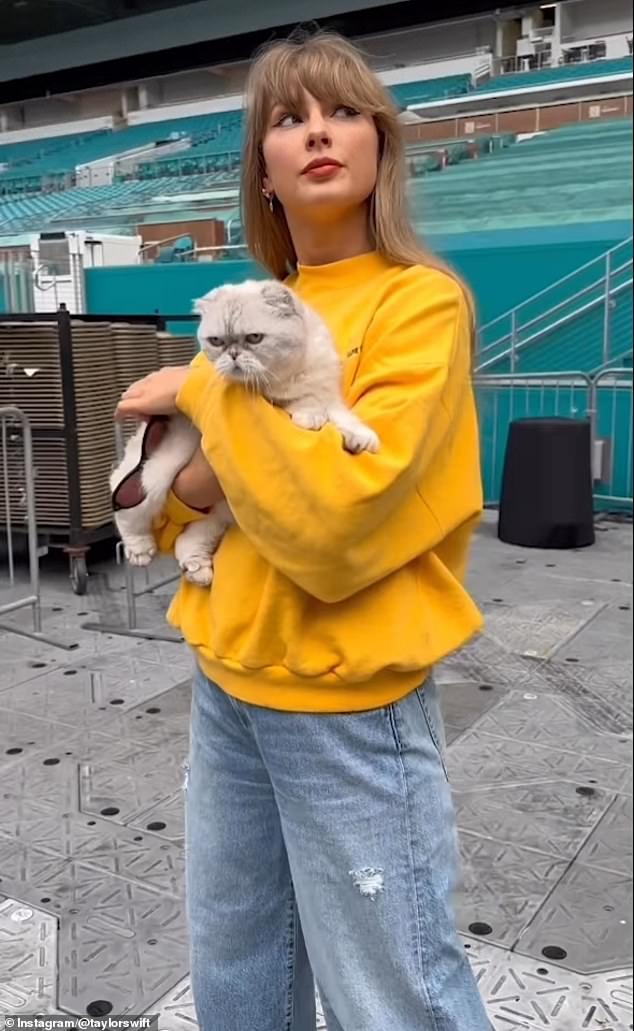 Taylor Swift shared a fun video on Instagram on Friday morning. The blonde beauty held her cat Olivia as she slowly took off her black sunglasses and looked around the Hard Rock Stadium in Miami, Florida