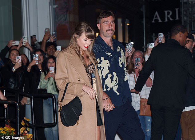 The song may have been a message about her boyfriend Travis Kelce, 35, who the singer has been dating for over a year (pictured in New York City, October 11)