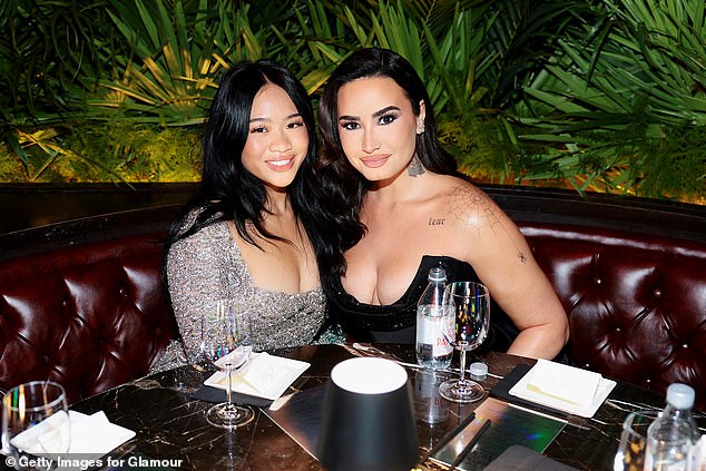 Lee was snapped with singers Beyonce and Demi Lovato at the lavish event in Times Square