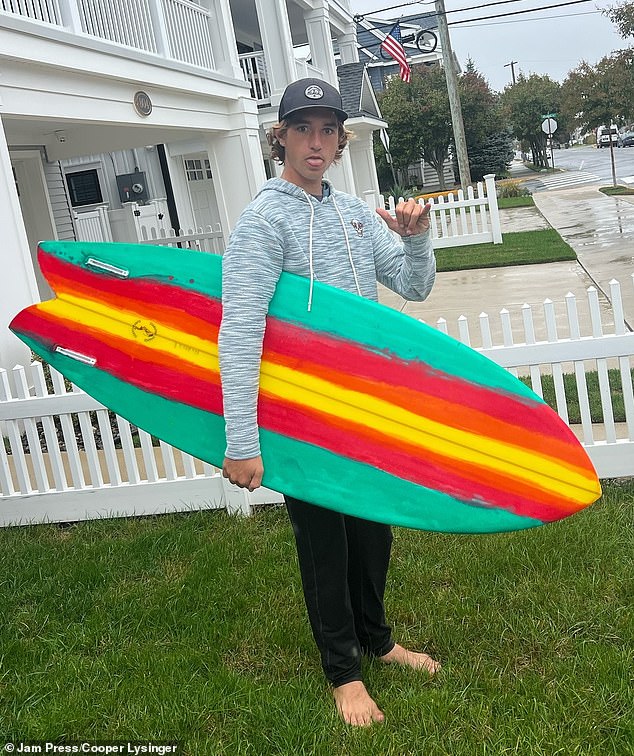 Cooper Lysinger, 18, of Ocean City, New Jersey, saved two fishermen who were swept away by a huge wave after jumping into action with his surfboard