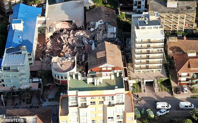 A drone shot shows the remains of the Dubrovnik hotel after it collapsed in the coastal city of Villa Gesell, Buenos Aires