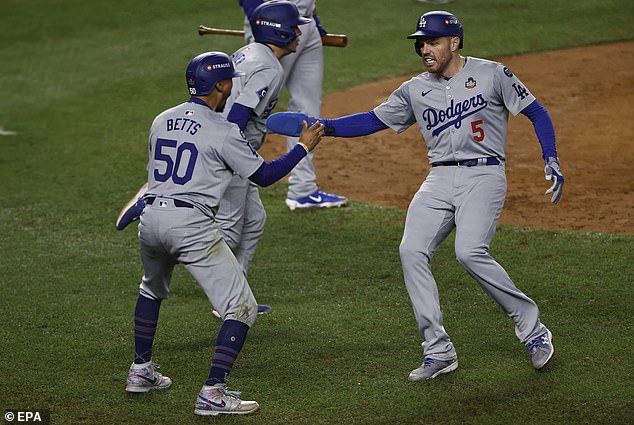 Freddie Freeman and Mookie Betts celebrate during the Dodgers' remarkable comeback