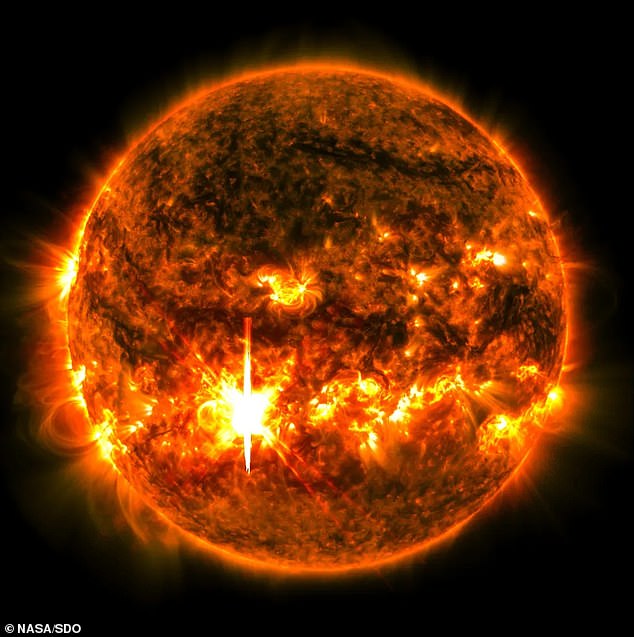 NASA's Solar Dynamics Observatory captured this image of the solar flare that erupted on October 1, 2024, visible as the bright flash in the lower left