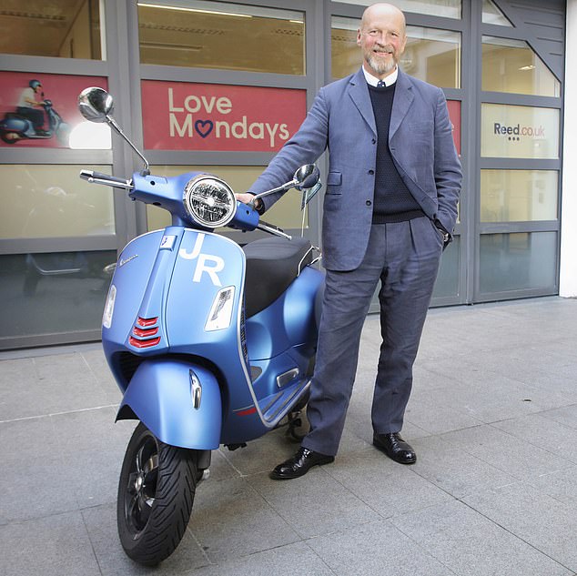 James Reed gets to work on a Vespa