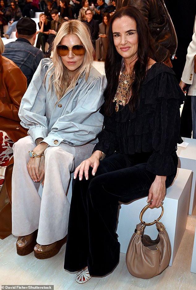 Sienna Miller and Juliette Lewis front row at the September 26 Chloe show for Paris Fashion Week - where Spring Summer 2025 pieces using suede were unveiled