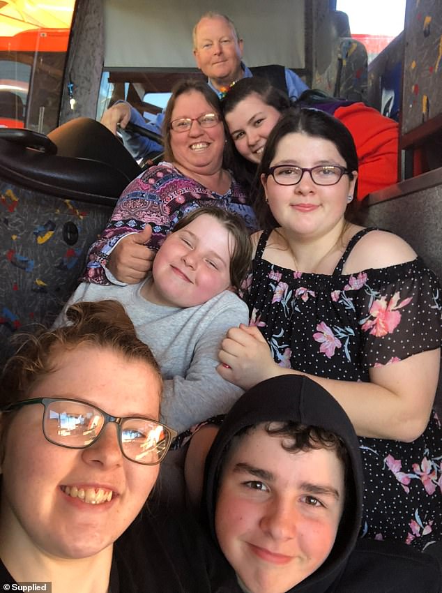 Sue and Graham Tait with their five children who were orphaned after their parents were killed in a head-on crash on the Newell Highway near Dubbo last Friday evening