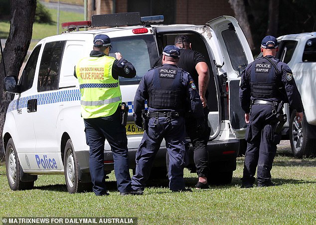 One man, who arrived in a car with high-ranking Bandidos, was led away in handcuffs