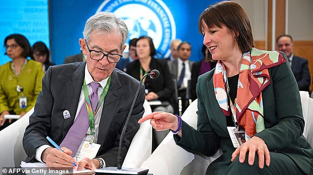 Rule change: Chancellor Rachel Reeves, recently pictured with US Federal Reserve Chairman Jerome Powell in Washington, has changed the way the national debt is measured