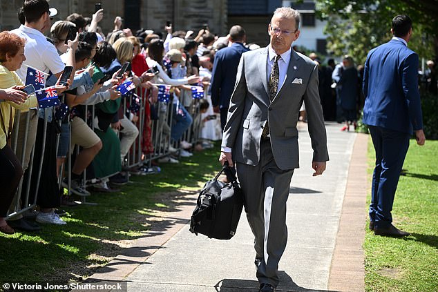 Another ominous sign of the King's ill health came when his doctor was photographed carrying a large medical bag as Charles and Camilla attended a church service on Sunday (pictured)