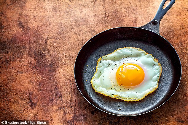 Overcooking eggs can lead to the release of harmful chemicals called oxysterols, which have been shown to increase the risk of heart disease and several forms of cancer (stock image)