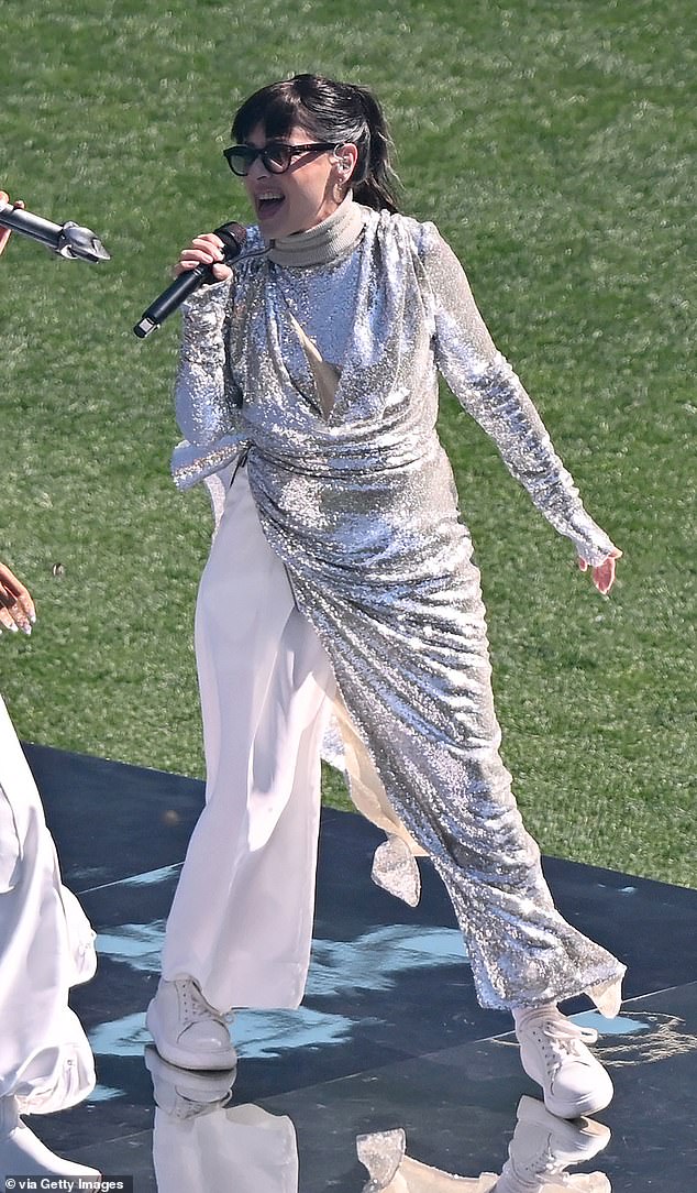 Australian pop icon Tina Arena has been criticized for her outfit choice during Saturday's AFL Grand Final performance with Katy Perry