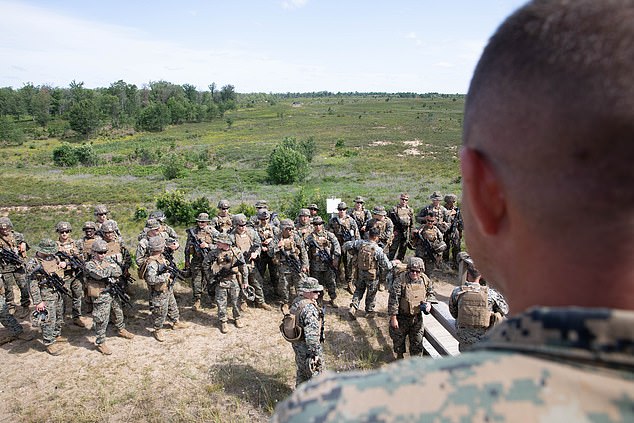 An officer gives the battalion safety briefing before Marines fire AT-4 rockets and M320 grenade launchers at a firing range during Northern Strike 23 at Camp Grayling, Michigan on August 7, 2023