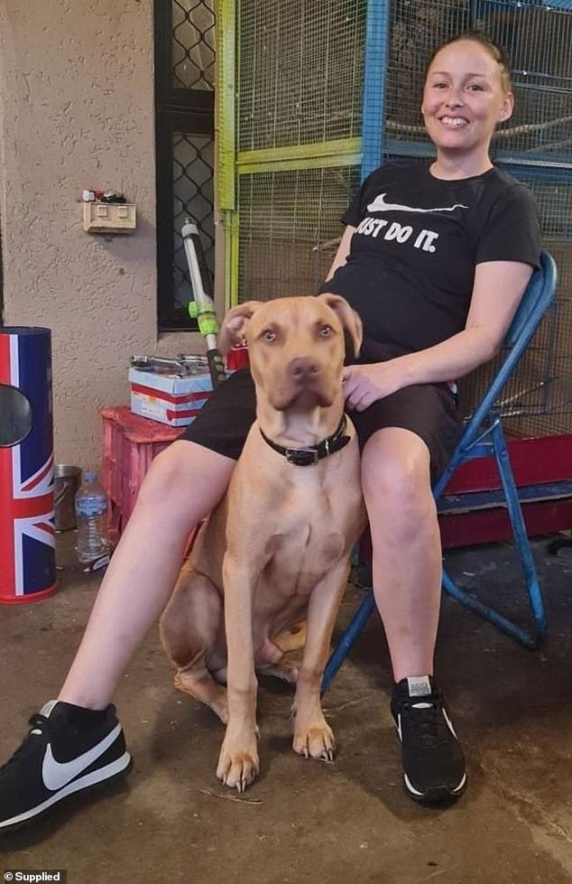 Annmarie Walters, 34, (pictured) was viciously attacked by her dog Buddy (pictured centre) at her home in Garbutt, a suburb of Townsville, north Queensland, on October 11.