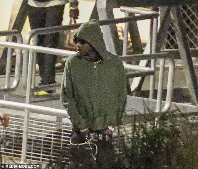 Travis Scott enjoyed a luxurious night in Sydney Harbor on a yacht on Sunday evening. Pictured