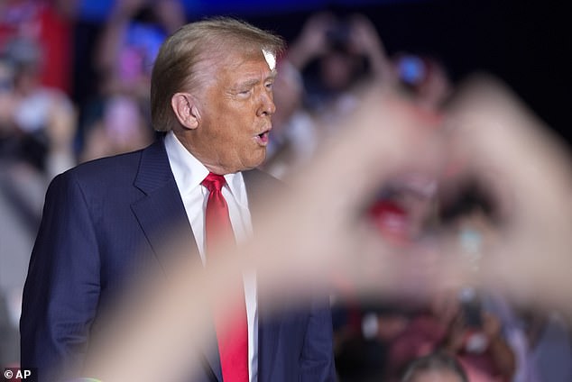 Republican presidential candidate, former President Donald Trump, arrives for a campaign rally at Greensboro Coliseum, Tuesday, Oct. 22, 2024, in Greensboro, NC. During the meeting, he wondered if Democratic presidential candidate Kamala Harris is using drugs or drinks after her 