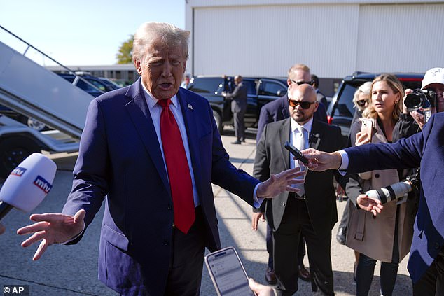 Former President Donald Trump spoke to reporters after landing in Detroit, Michigan