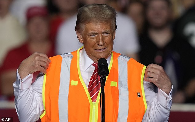 Donald Trump gave hilarious insight into his campaign team's decision to put him in a fluorescent orange jacket during his rally in Green Bay, Wisconsin last night