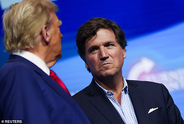 Former Fox News host Tucker Carlson compared Donald Trump to a father who is 'pissed off' that his children are misbehaving, prompting new rally song: 'Daddy's home'