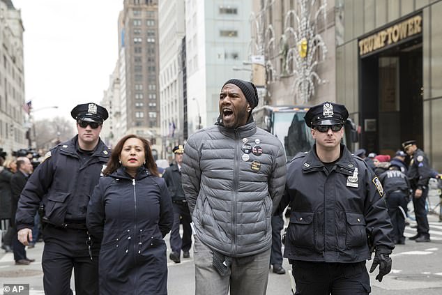 Jumaane Williams, next in line to become mayor of New York, was found to have received $5,000 in donations from donor Tolib Mansurov – who was named in Mayor Eric Adams' indictment. Pictured: Police officers take Williams into custody after he and others blocked traffic on Fifth Avenue outside Trump Tower in New York, January 20, 2017, during a protest during President Donald Trump's inauguration