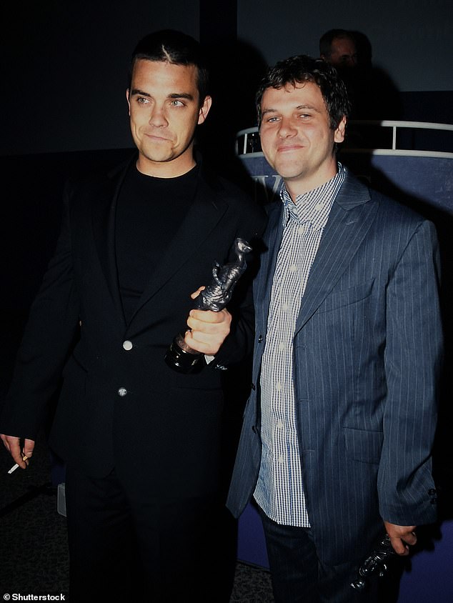 Leading songwriter Guy Chambers (right) with Take That star Robbie Williams (left) in 1999