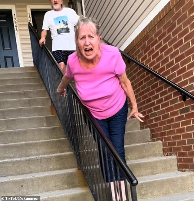 An elderly couple was seen becoming angry with their neighbor after she knocked on the back door of their home, which appeared to be the trigger for the 'outburst argument'