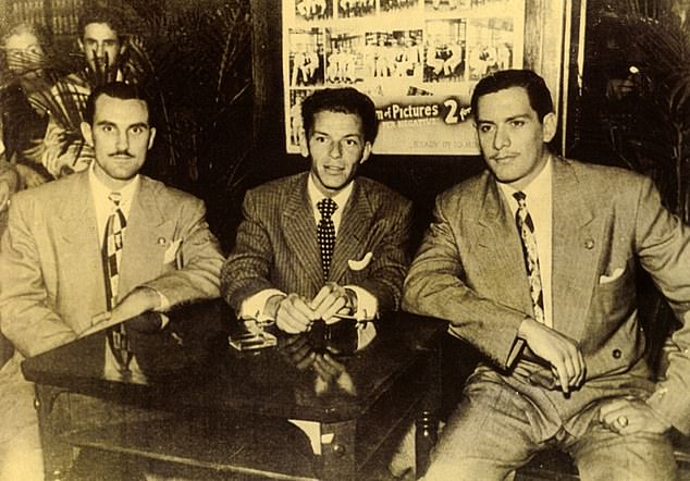 Sinatra was often photographed with members of the Mafia - here he is sandwiched between the Fischetti brothers, members of the Chicago Mafia who had ties to Al Capone