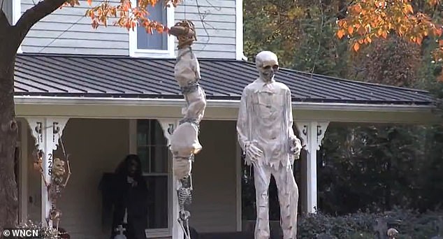 A Wake Forest, North Carolina resident's Halloween tradition is raising concerns among some residents, with one home's decoration sparking outrage