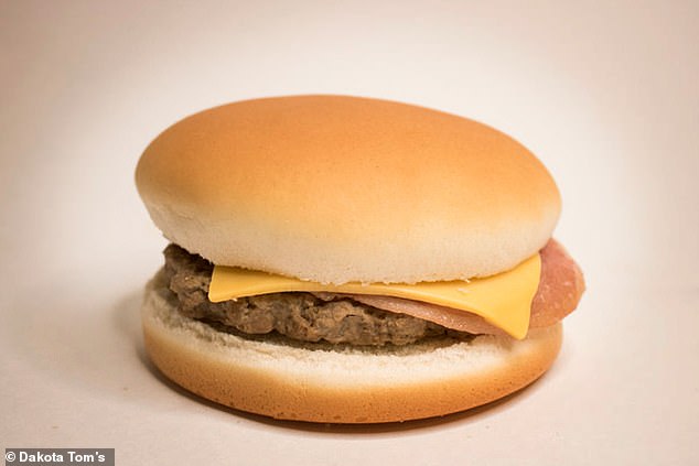 A South Dakota sandwich maker is recalling some of its burgers over concerns they may be contaminated with listeria. Pictured: Dakota Tom's Sandwiches, premade Bacon Cheeseburger - one of three sandwiches being rolled back out of an abundance of caution