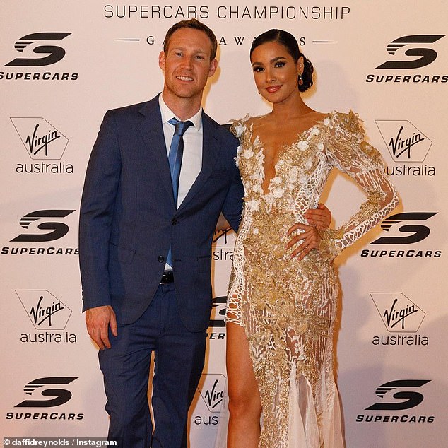 Aussie V8 Supercars star David Reynolds has claimed he and partner Tahan Lew-Fatt (pictured together) had an encounter with a ghost