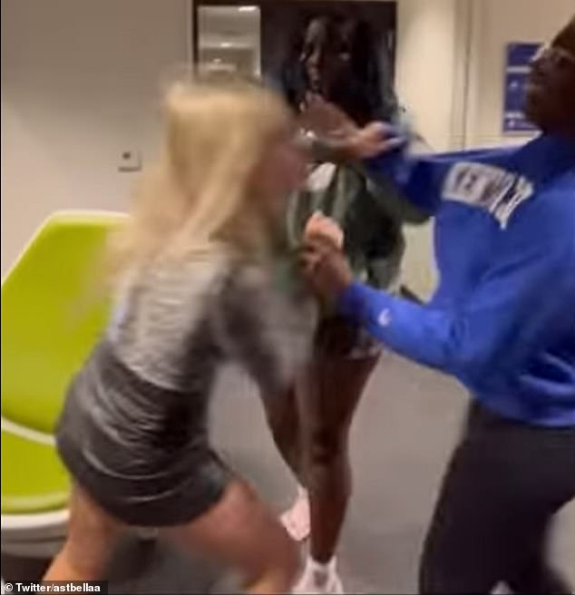 Rosing was caught on camera launching herself at freshman Kylah Spring, who was manning the front desk of her dorm room, and calling her the N-word