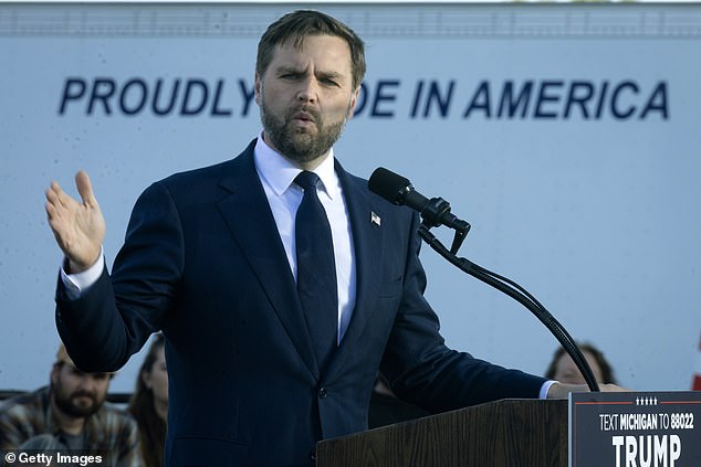 Vance also declined to answer Selvig's question about whether he would concede if Kamala Harris won the 2024 election. Pictured: Vance speaks during a rally on the grounds of Berlin Raceway on October 2 in Marne, Michigan