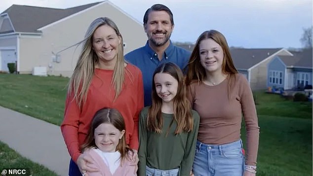 A Republican running for Congress in Virginia has gone viral after a family photo he used in a campaign ad was not what it seemed