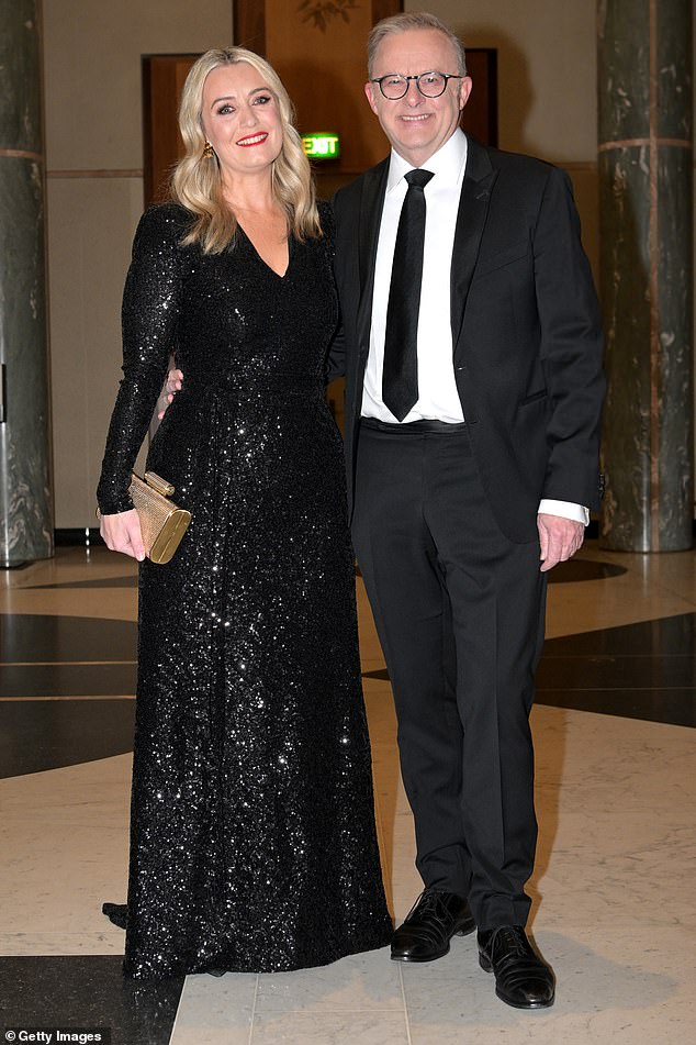 A shocking new survey has revealed that more than a third of Australians blame Anthony Albanese's government for the cost of living. Mr Albanese is pictured with his fiancée Jodie Haydon