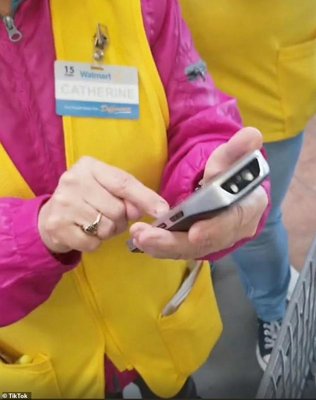 A viral video shows Walmart employees scanning customers' receipts as they leave the store